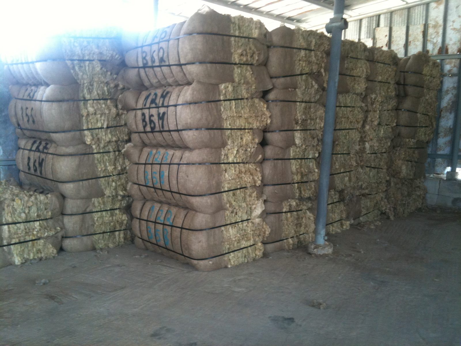 Wool stock held in a KBD Fibers warehouse, ready for delivery
